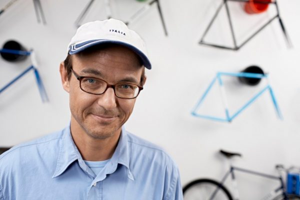 portrait of a man in a bikestore