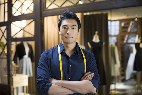 Portrait of Chinese male fashion designer